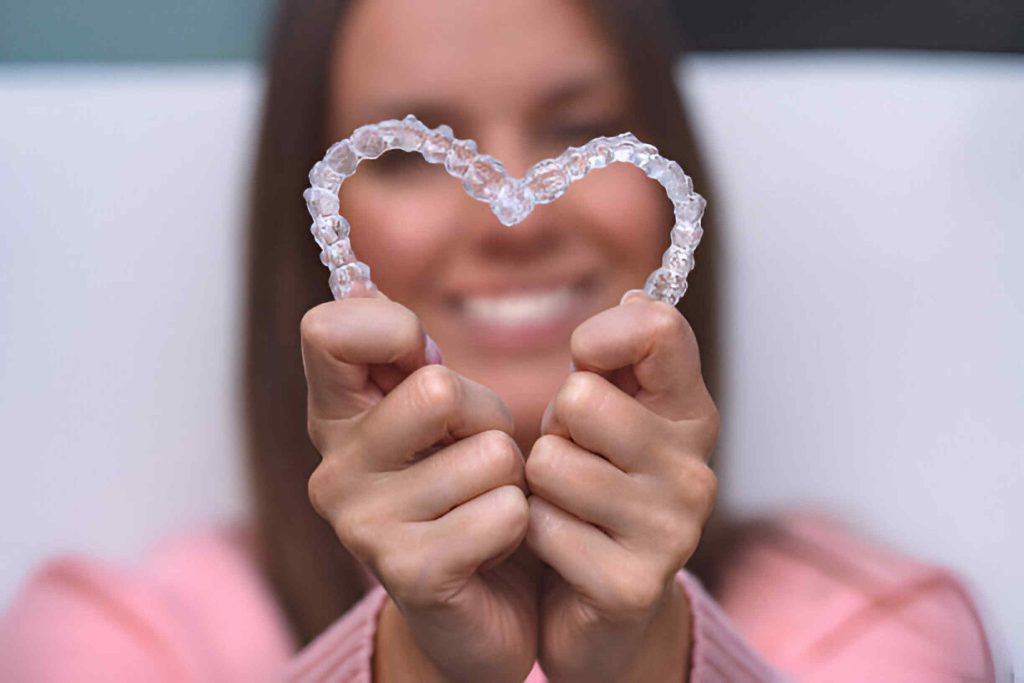 Braces vs. Clear Aligners for Adults | Pros, Cons & Expert Guide